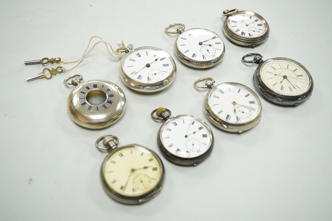 Seven assorted mainly early 20th century silver open faced pocket watches including a chronograph by William Williams of Bury, case diameter 53mm and one other silver pocket watch case(no movement).